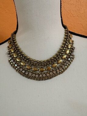 Layered Gold-Tone Statement Necklace with Crystal Accents